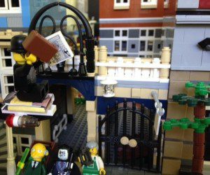 Lego Fernando Pessoa escapes his captors on a volume of Pablo Neruda's poems, shouting, "Books can take you anywheeerrre..."