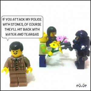The PM said, "If you attack my police with stones, of course they will use water cannons and teargas." The next day, protesters were out on the streets, giving flowers to the police. The result was the same though, being teargassed by the police.