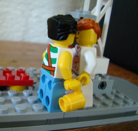 Fiona is glad her parents didn't come to the game so she could celebrate with Elvis rather than with the guy they want her to marry. Wild party = messed up hair.