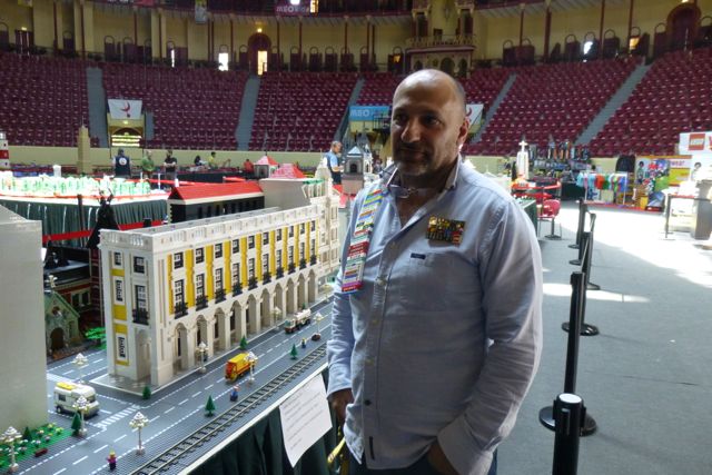 Pedro Nascimento with his model-in-progress of the Terreiro do Paço in Lisbon. The final product will take 18 months and 6.8 million pieces.
