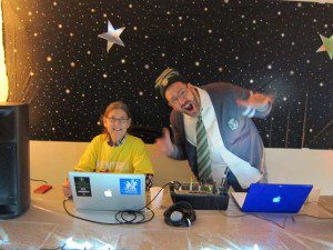 Classmate Rob Costello and I DJ'ing the party at the winter 2012 VCFA residency. Photo by Shelby Hogan.