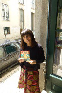 Author Isabel Minhós Martins with the Brazilian edition of O Mundo Num Segundo, which I translated to become The World in a Second.